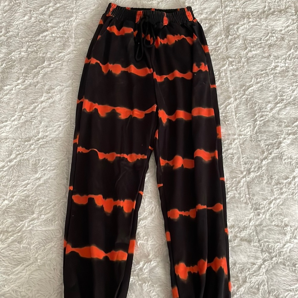 black and orange striped womens sweatpants.  size xs woman’s. shein